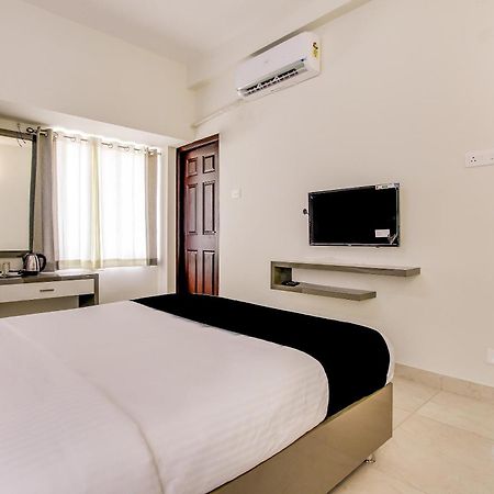 Capital O New Paradise Inn Irugur Dış mekan fotoğraf